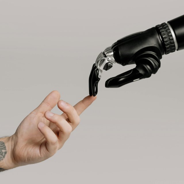 Michelangelo's "The Creation of Adam" with robotic arm.
