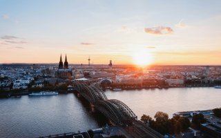 View of Cologne Cathedral and the Hohenzollern Bridge.