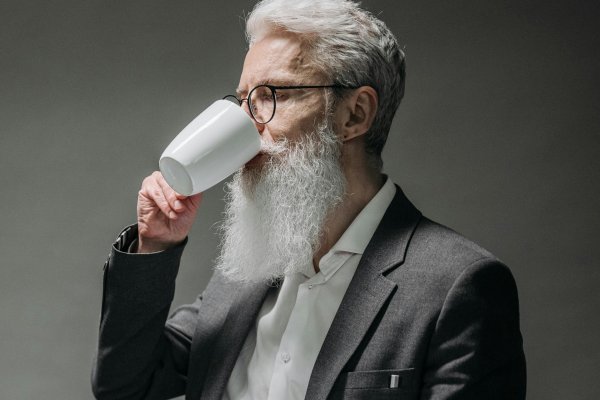 Scientist drinking coffee.
